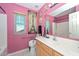 Bright bathroom with vanity, toilet, a Paris themed picture and decorative elements at 10806 W Adam Ave, Peoria, AZ 85373