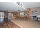 Spacious dining room showcasing a wooden table and chairs, shelving, and neutral walls at 10806 W Adam Ave, Peoria, AZ 85373