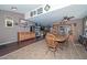 Open dining area featuring a wooden table and chairs plus decorative shelving at 10806 W Adam Ave, Peoria, AZ 85373