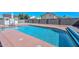 Inviting outdoor swimming pool with a stone deck, surrounded by a wall for privacy at 10806 W Adam Ave, Peoria, AZ 85373