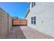 Gated side yard with rock cover at 10806 W Adam Ave, Peoria, AZ 85373