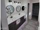 Stylish bathroom featuring double sinks, vanity, and modern fixtures at 1352 W Spine Tree Ave, Queen Creek, AZ 85140