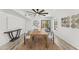 Dining room features a ceiling fan, table, and sliding door with patio access at 13626 N 89Th St, Scottsdale, AZ 85260