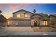 Charming two-story home featuring a three-car garage, well-kept yard, and covered entry at 13626 N 89Th St, Scottsdale, AZ 85260