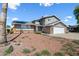 Charming two-story home features a two-car garage, solar panels and a low maintenance front yard at 15410 N 60Th Ave, Glendale, AZ 85306
