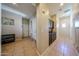 Inviting entryway with tiled flooring and stylish built-in storage cabinets at 16368 W Cortez St, Surprise, AZ 85388