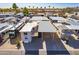Single Gathering home featuring a covered parking area, cozy front patio, and desert landscaping at 17200 W Bell Rd # 1801, Surprise, AZ 85374