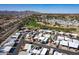 Aerial view showcasing the community, golf course, and surrounding mountain landscape at 17200 W Bell Rd # 1801, Surprise, AZ 85374