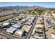 An aerial shot capturing an active adult community, showcasing homes, streets and mountain views at 17200 W Bell Rd # 1801, Surprise, AZ 85374
