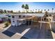 Single Gathering home featuring a covered parking area, cozy front patio, and desert landscaping at 17200 W Bell Rd # 1801, Surprise, AZ 85374