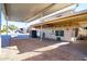 Exterior showcasing carport, desert landscaping, and tidy curb appeal at 17200 W Bell Rd # 1801, Surprise, AZ 85374