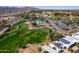 Aerial shot of golf course, community center, and surrounding desert homes and landscape at 17200 W Bell Rd # 1801, Surprise, AZ 85374