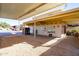 An expansive covered patio area shows a large open space, multiple awnings, and plenty of room for outdoor entertaining at 17200 W Bell Rd # 1801, Surprise, AZ 85374