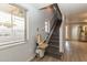 The staircase has a chair lift to aid accessibility to the second floor at 17200 W Bell Rd # 1801, Surprise, AZ 85374