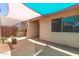 Cozy, shaded back patio with privacy fence at 1822 S River Dr, Tempe, AZ 85281