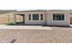 Home exterior, view of backyard, patio, and artificial turf at 18854 W Poinsettia Dr, Surprise, AZ 85388