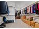 Spacious walk-in closet with ample storage, shelving, and hanging space at 18854 W Poinsettia Dr, Surprise, AZ 85388