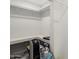 Walk-in closet with built-in shelves providing ample storage solutions at 1916 W Tonto St, Phoenix, AZ 85009