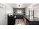 Well-lit kitchen showcasing gray cabinets, a subway tile backsplash, and modern appliances at 1916 W Tonto St, Phoenix, AZ 85009