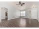 Bright living room featuring wood-look floors, neutral paint, and natural light at 19802 N 3Rd Ave, Phoenix, AZ 85027