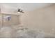 An airy bedroom with a ceiling fan, window and bare floors awaiting personalization at 2018 W Taro Ln, Phoenix, AZ 85027