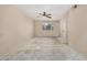A bedroom with a window and ceiling fan ready for your personal touch at 2018 W Taro Ln, Phoenix, AZ 85027