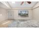 Spacious living room featuring bright lighting, skylights, and neutral paint, ready for customization at 2018 W Taro Ln, Phoenix, AZ 85027