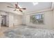Bright living room with vaulted ceilings, skylights, and large windows, offering natural light at 2018 W Taro Ln, Phoenix, AZ 85027