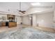 Open-concept living space with vaulted ceilings, skylights, and tile flooring throughout at 2018 W Taro Ln, Phoenix, AZ 85027