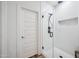 Modern bathroom featuring a glass-enclosed shower with a rainfall showerhead at 20198 E Rosa Rd, Queen Creek, AZ 85142