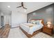 Spacious bedroom featuring wood floors, recessed lights, and a decorative ceiling fan at 20198 E Rosa Rd, Queen Creek, AZ 85142
