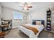Comfortable bedroom with ceiling fan, natural light and charming decor elements at 20198 E Rosa Rd, Queen Creek, AZ 85142