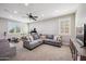 Spacious bonus room with plush carpeting, natural light, and exercise equipment at 20198 E Rosa Rd, Queen Creek, AZ 85142
