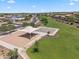Community park with playground, covered picnic area, basketball court, and open green space at 20198 E Rosa Rd, Queen Creek, AZ 85142