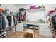 Organized walk-in closet with shelving, drawers, and ample storage space at 20198 E Rosa Rd, Queen Creek, AZ 85142