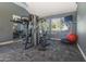 Fully-equipped gym with weight machines, a mirror wall, and views through the window at 2333 E Southern Ave # 2033, Tempe, AZ 85282
