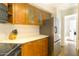 Well-lit kitchen with sleek stainless-steel appliances, modern countertops, and a convenient layout at 2333 E Southern Ave # 2033, Tempe, AZ 85282
