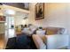 Bright living room boasts a lofted ceiling, stylish furnishings, and an adjacent dining area for a modern living experience at 2333 E Southern Ave # 2033, Tempe, AZ 85282