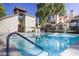 Beautiful community pool with blue water and plenty of lounge chairs and nearby building access at 2333 E Southern Ave # 2033, Tempe, AZ 85282