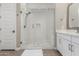 Modern bathroom featuring a frameless glass shower with a built-in niche and bench, plus a floating vanity at 23448 N 76Th Pl, Scottsdale, AZ 85255