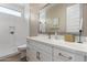 Elegant bathroom with a glass-enclosed shower, sleek vanity, and modern fixtures, creating a spa-like retreat at 23448 N 76Th Pl, Scottsdale, AZ 85255