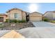 Charming home featuring desert landscaping and a neutral color palette at 23448 N 76Th Pl, Scottsdale, AZ 85255