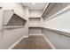 Spacious walk-in closet with shelving and ample storage space at 23448 N 76Th Pl, Scottsdale, AZ 85255