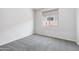 Neutral bedroom with one window, gray carpet, and offers a serene space at 25727 N 161St Ave, Surprise, AZ 85387