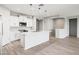 Modern kitchen featuring an island with bar seating and stainless steel appliances at 25727 N 161St Ave, Surprise, AZ 85387
