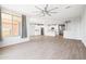 Open-concept floor plan with a view of the kitchen and neutral color palette at 25727 N 161St Ave, Surprise, AZ 85387