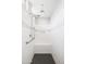 Modern walk-in shower featuring a bench and dual shower heads at 25727 N 161St Ave, Surprise, AZ 85387