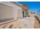 Backyard view of the patio showcasing stucco wall and screens for comfort and privacy at 2647 N Miller Rd # 6, Scottsdale, AZ 85257