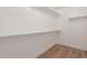 Bright closet with built-in shelving offers organized storage space and clean, modern aesthetic at 2647 N Miller Rd # 6, Scottsdale, AZ 85257