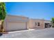 Delightful single-story home featuring an attached garage and inviting curb appeal at 2647 N Miller Rd # 6, Scottsdale, AZ 85257